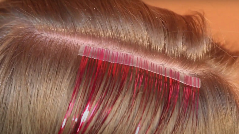 tinsel hair tape attached to hair