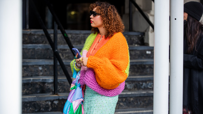 woman wearing crochet sweater