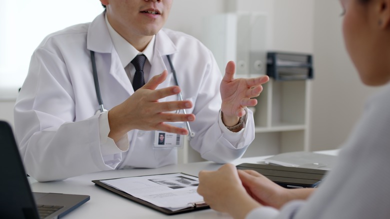 Doctor speaking to patient.