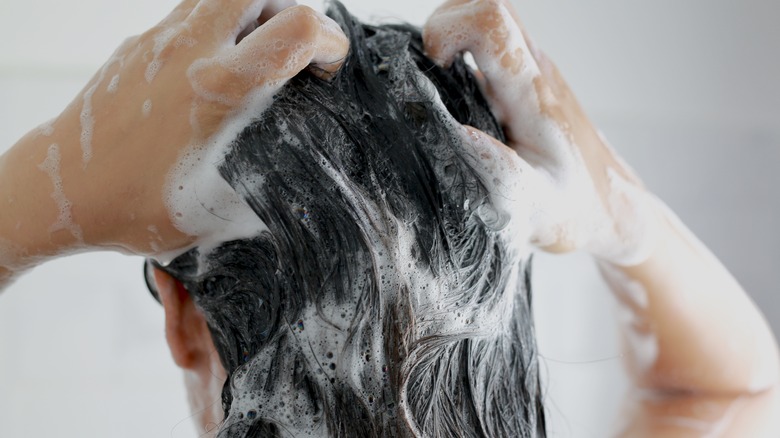 Woman washing her hair