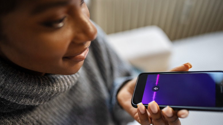 A woman using her phone