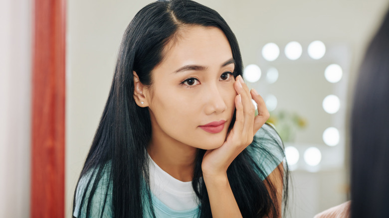 Girl looking at dark circles