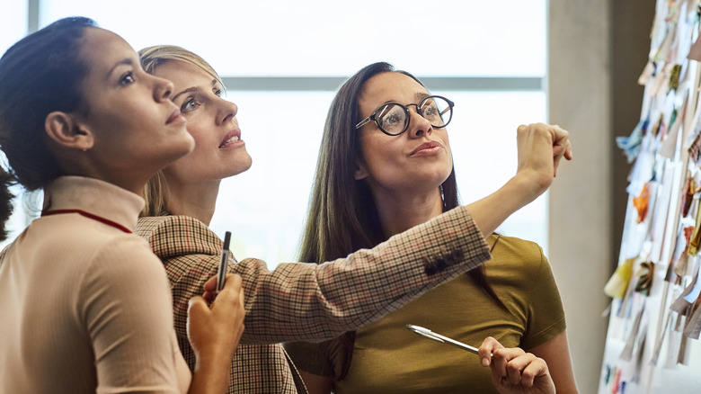 Three women making a decision at work