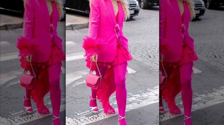 Pink pantsuit with train