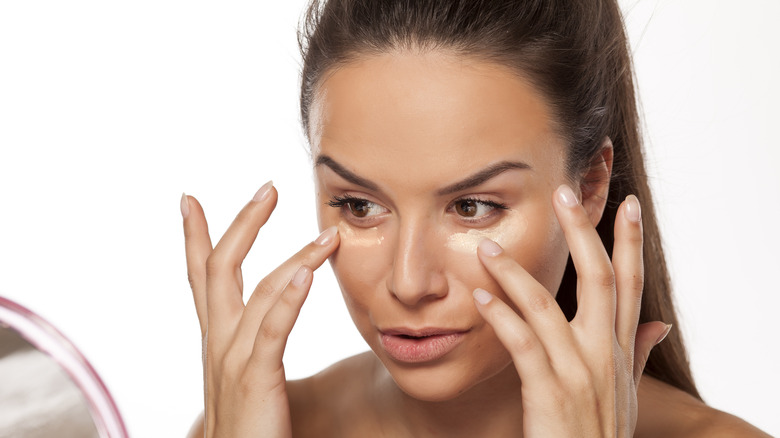 woman applying primer