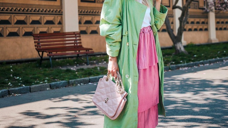 Pink skirt and green jacket