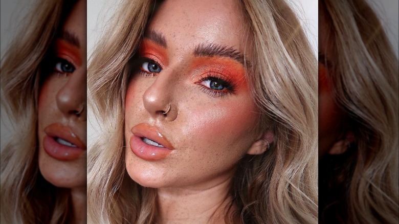 Woman wearing peach makeup 