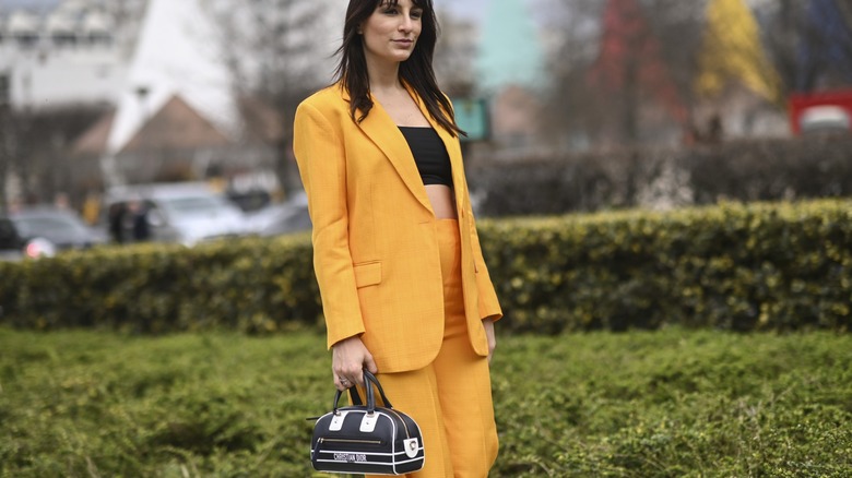 woman wearing suit and tube top