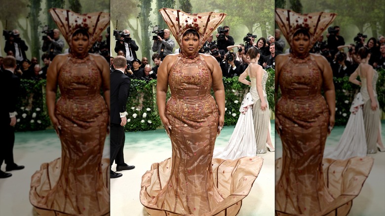 Lizzo wearing a light-brown intricate dress at the Met Gala