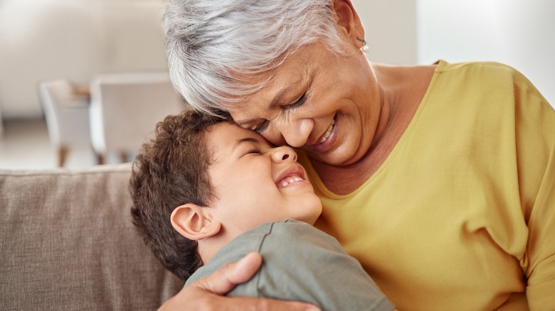 Grandmother and grandson hugging