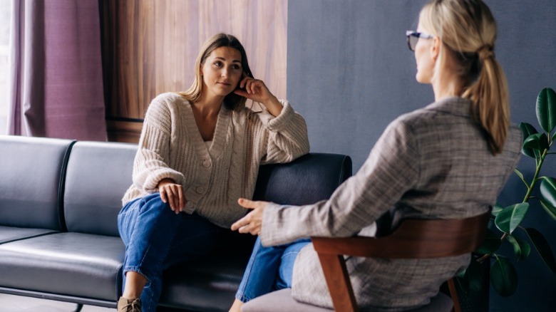 Woman speaking to therapist