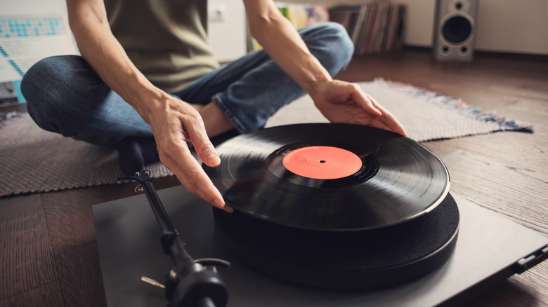 Placing vinyl record on turntable