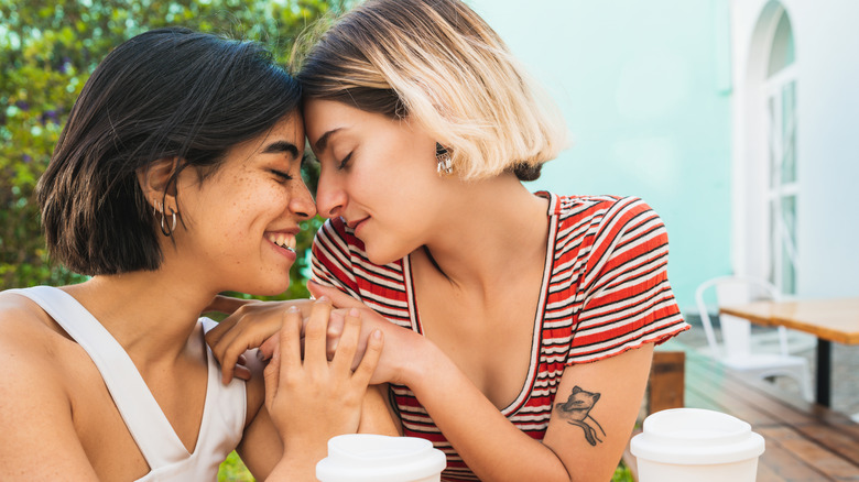 two women holding hands