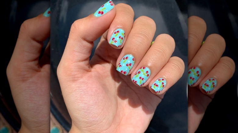 Baby blue cherry nails