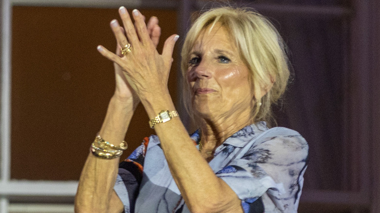 Jill Biden applauding with arms raised