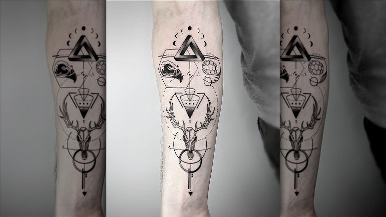 arm with greyscale geometric tattoo