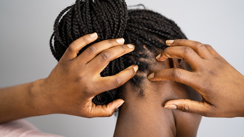 Woman with an itchy scalp