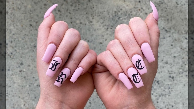 pink nails with initials 