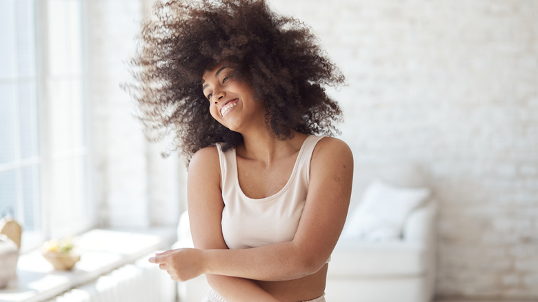 smiling woman dancing