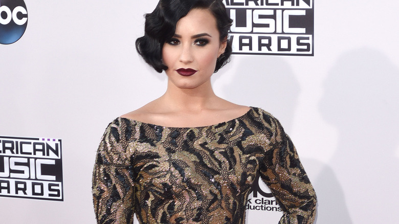 Demi Lovato in gown, vamp makeup p