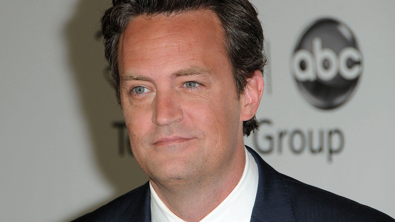 Matthew Perry in jacket and tie