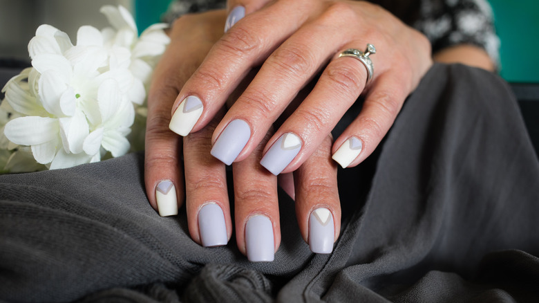 hands with lavender nails