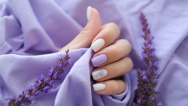 hand with lavender nails