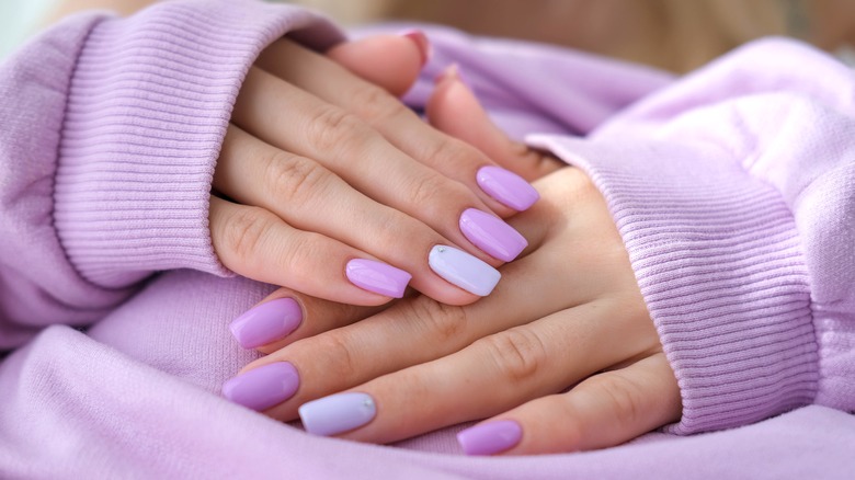 hands with lavender nails