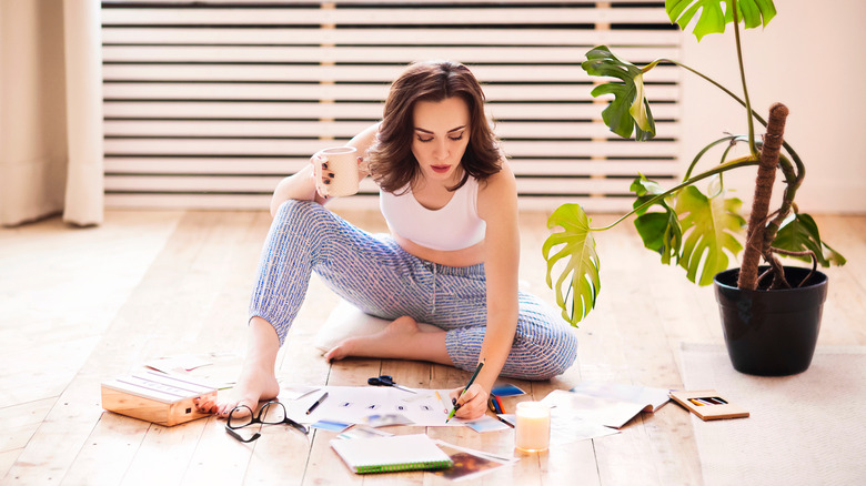 Woman making vision board