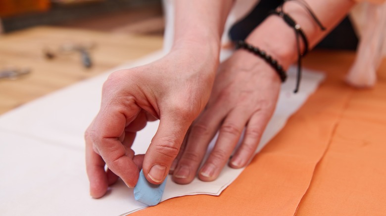 Woman using fabric chalk