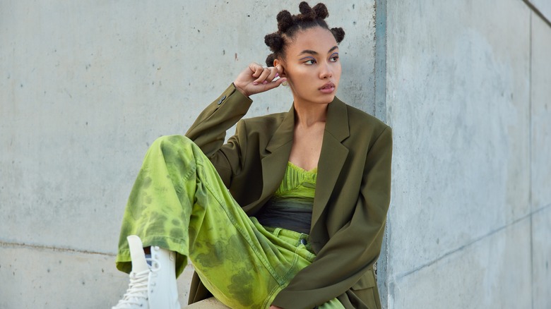 Woman in green outfit