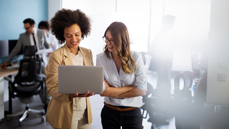 Two women working