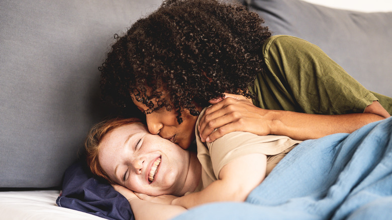 two women in bed