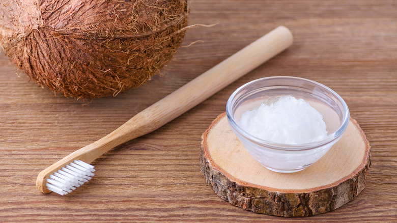 Coconut oil used as natural toothpaste 