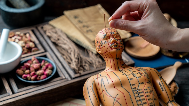 Different acupuncture points on the body