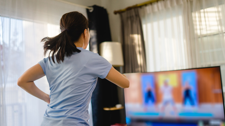 person playing virtual dance game