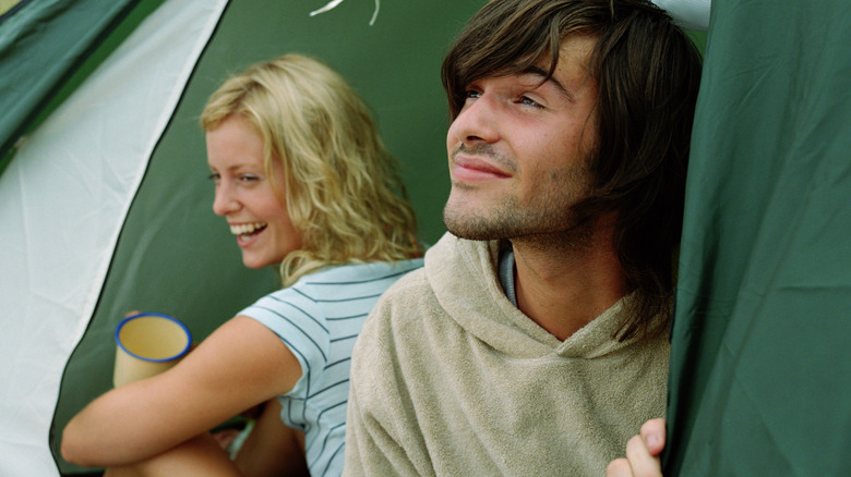 Couple laughing in tent