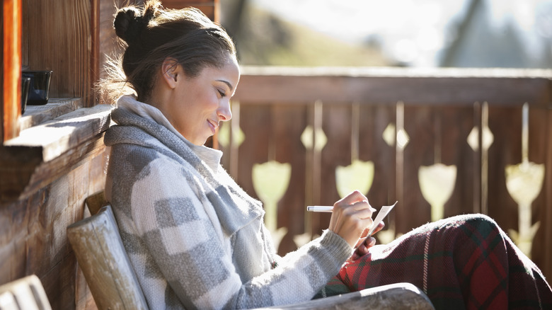 Woman outside smiling