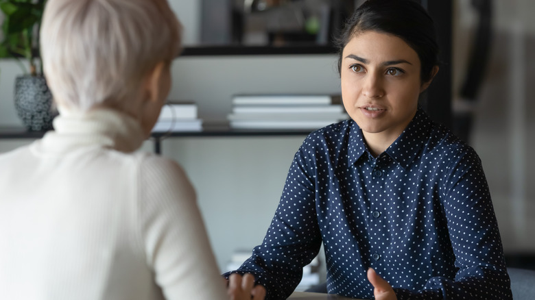 two women talking