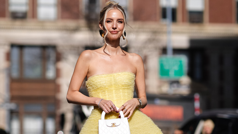 woman with yellow minidress