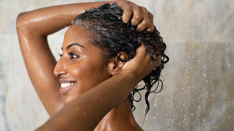 woman washing her hair 