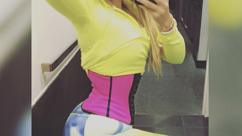 Khloé Kardashian wearing waist trainer