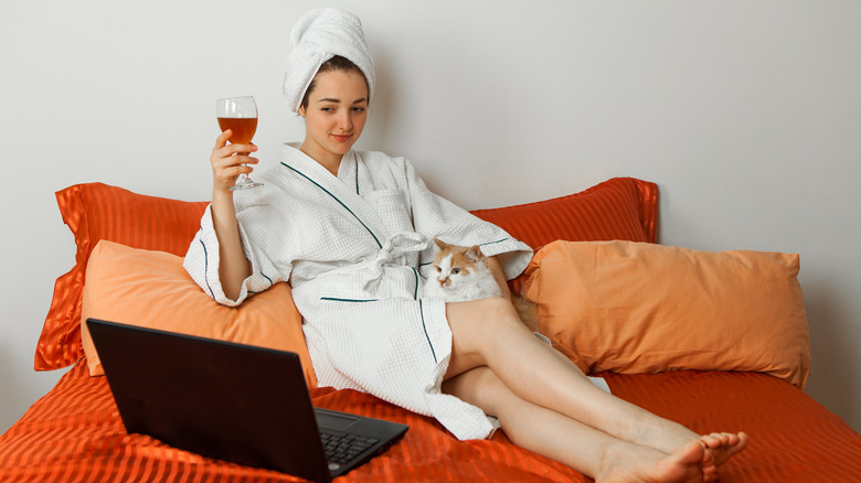 Woman relaxing on bed