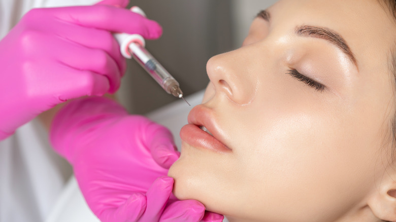 woman getting lip injection