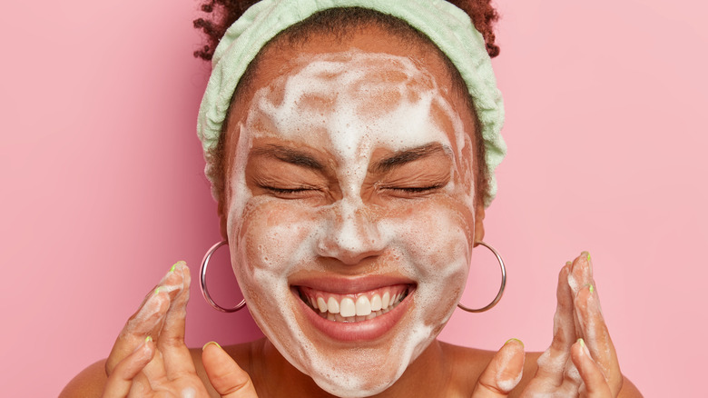 woman washing face