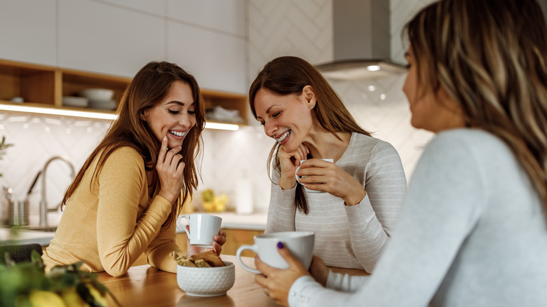 Group of friends chatting over coffee