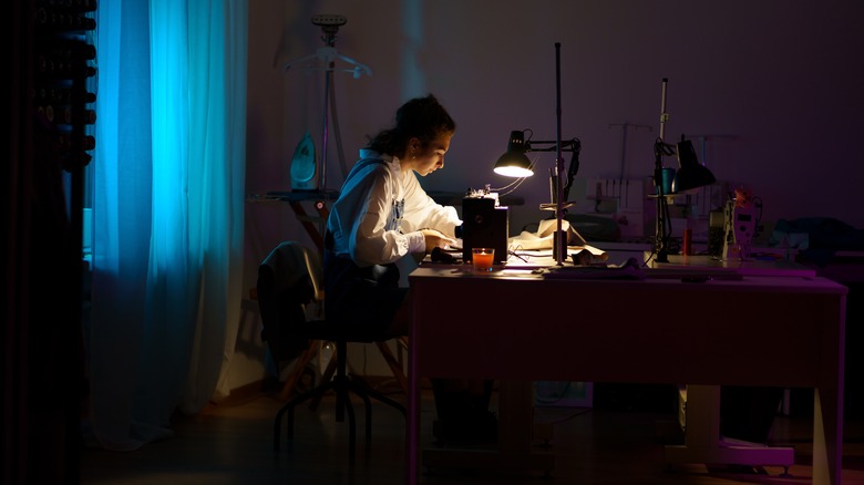 fashion designer working in studio 