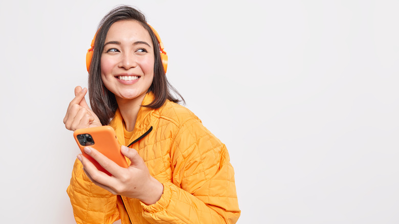 woman in yellow jacket