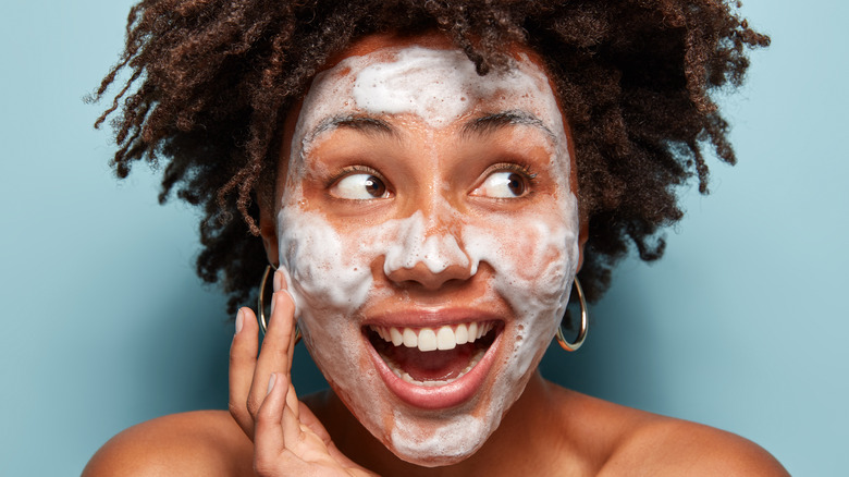 woman washing face