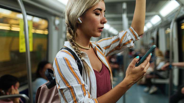 Woman holding phone